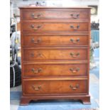 A Modern Yew Wood Six Drawer Chest with Bracket Feet, One Handle Missing, 79cms Wide