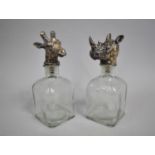A Pair of Novelty Spirit Decanters with Giraffe and Rhino Head Stoppers, 24cms High