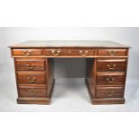 An Early/Mid Kneehole Writing Desk in Mahogany, with Tooled Leather Top, 143cs Wide
