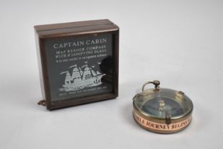 A Reproduction Model of a Captain's Cabin Map Reader Compass with Magnifying Glass, as made by