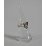 A Silver Dress Ring with Amethyst Teardrop Stone