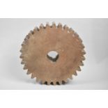 A Turned Wooden Cog, 27cms Diameter