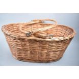 A Vintage Two Handled Wicker Oval Basket, 49cms Wide
