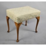 A Mid 20th Century Walnut Framed Dressing Table Stool on Cabriole Supports, 54cms Wide