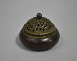 A Circular Oriental Bronze Censer with Pierced Lid, 10cms Diameter