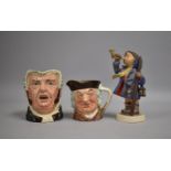 A Goebels Figure of a Boy Blowing Horn together with Two Royal Doulton Small Character Jugs