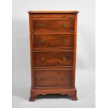 A Reproduction Bradley Narrow Chest of Four Graduated Drawers with Brushing Slide Over, 41cms Wide