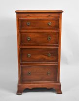 A Reproduction Bradley Narrow Chest of Four Graduated Drawers with Brushing Slide Over, 41cms Wide