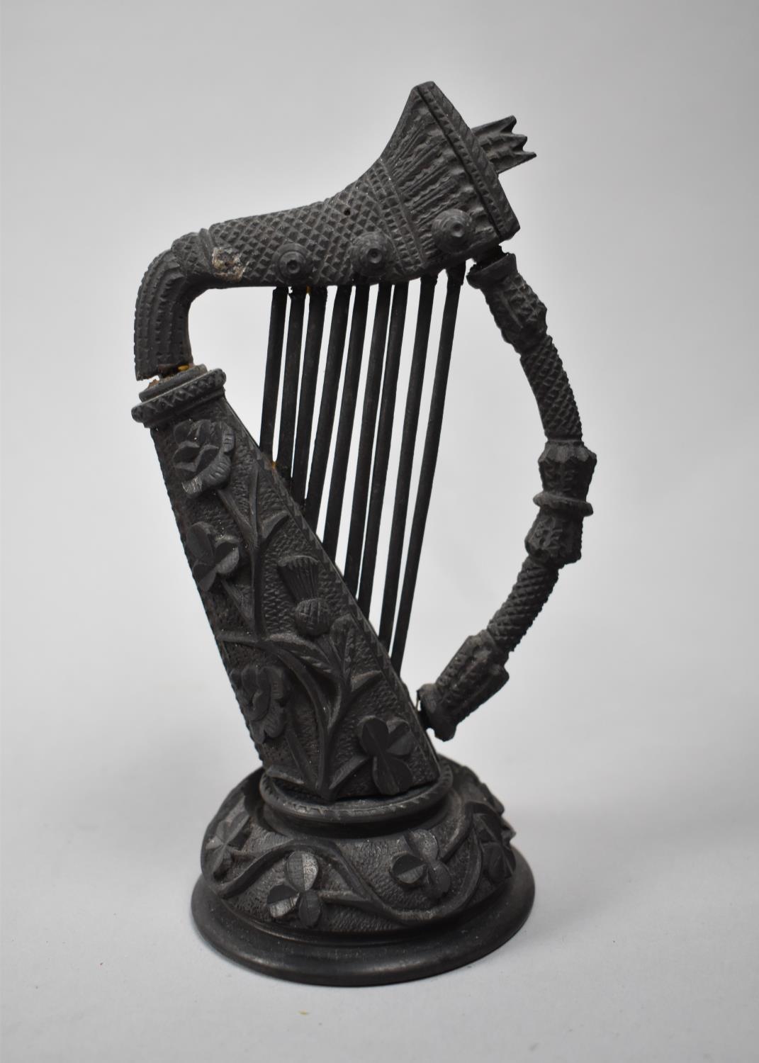 An Irish Carved Bog Oak Model of a Harp, Some Losses, 17cms High