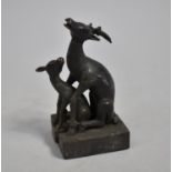 A Reproduction Novelty Bronze Oriental Two Part Desk Top Seal in the Form of Stag and Hind Mating,