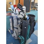 A Collection of Four Various Golfing Bags, Irons and Drivers, Putting Mat and Range Holder