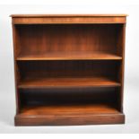 A Modern Adjustable Two Shelf Open Bookcase in Mahogany, 91cms Wide