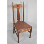 An Oak Framed Arts and Crafts Side Chair with Inlaid Top Rail