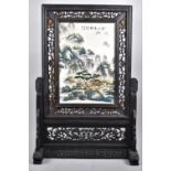 A Large Reproduction Chinese Porcelain Table Screen in Carved and Pierced Wooden Stand, 68cms High
