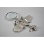 A Novelty Desk Top Silver Plated Magnifying Glass in the Form of a Twin Engined Aircraft, 24cms Long