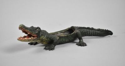 A Reproduction Cold Painted Bronze Novelty Match Holder in the Form of a Crocodile, 23cms Long