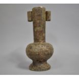 A Chinese Bronze Vase of Archaic Form decorated in Relief, 28cms High