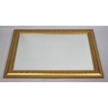 A Large Gilt Framed Modern Rectangular Wall Mirror, 90x65