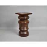 A 19th Century Mahogany Display Plinth with Turned and Carved Decoration, 23cms Wide and 44cms High