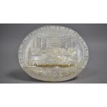 A Carved and Pierced Mother of Pearl Shell, The Last Supper, with Easel Back, 16cms Wide