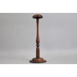 A 19th Century Turned Mahogany Wig Stand, 29cm high