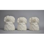 A Set of Three Late 19th Century Graduated Jugs in the Form of a Spaniel, 13cms High