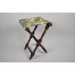 A 19th Century Folding Campaign Stool with a Tapestry Seat, 57cms High