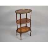 A Late 19th/Early 20th Century French Oval Three Tier Inlaid Whatnot with Ormolu Gallery to Top