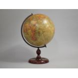 An Early 20th Century Geographia 10 Inch Terrestrial Globe on a Turned Wooden Stand, 40cms HIgh