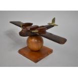 A Mid 20th Century Desk Top Wooden Model of a Aeroplane with Brass Propellers and Tail, Mounted on