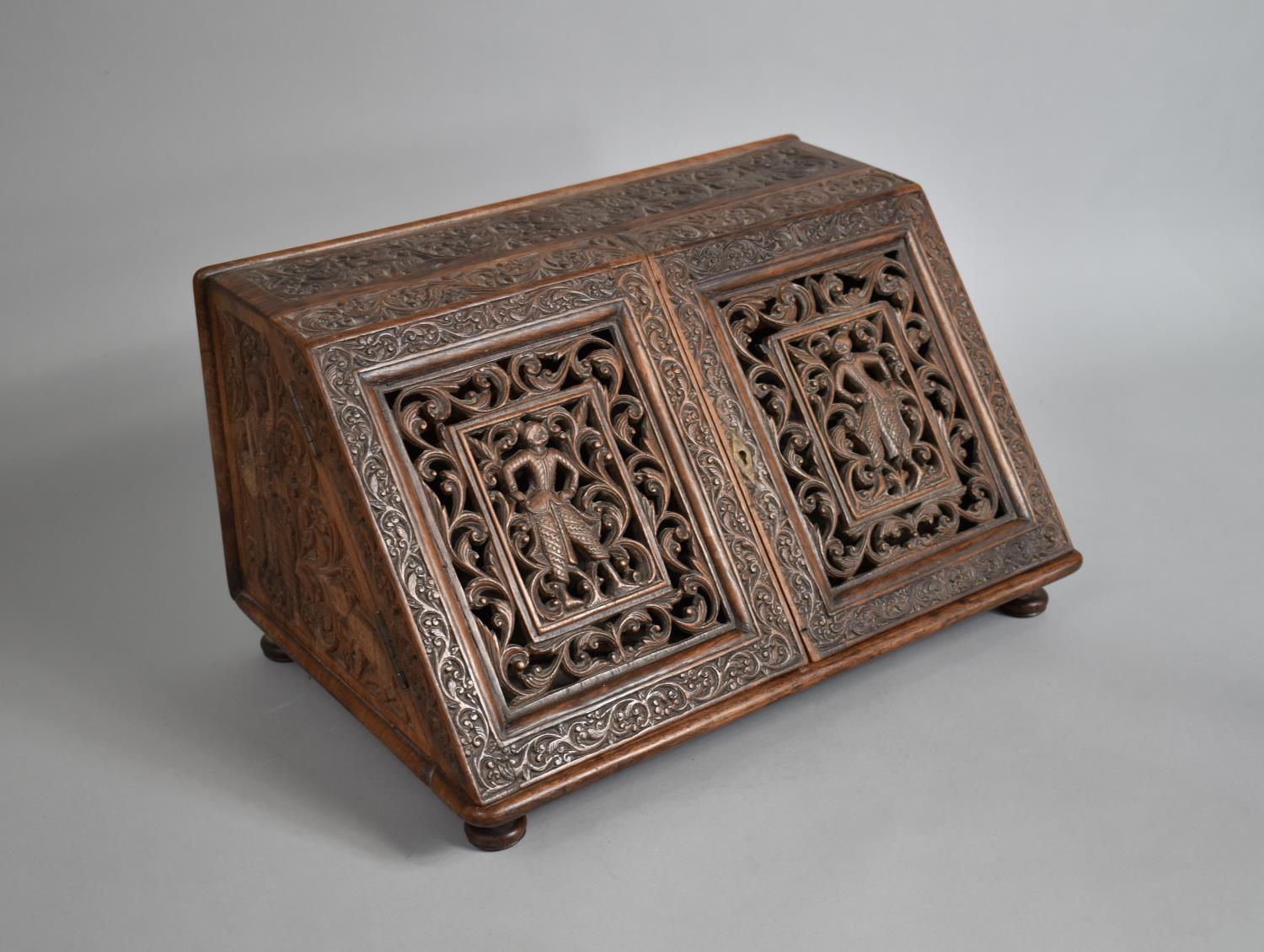 A 19th Century Anglo Indian Colonial Stationery Cabinet with Intricately Carved Decoration and Doors