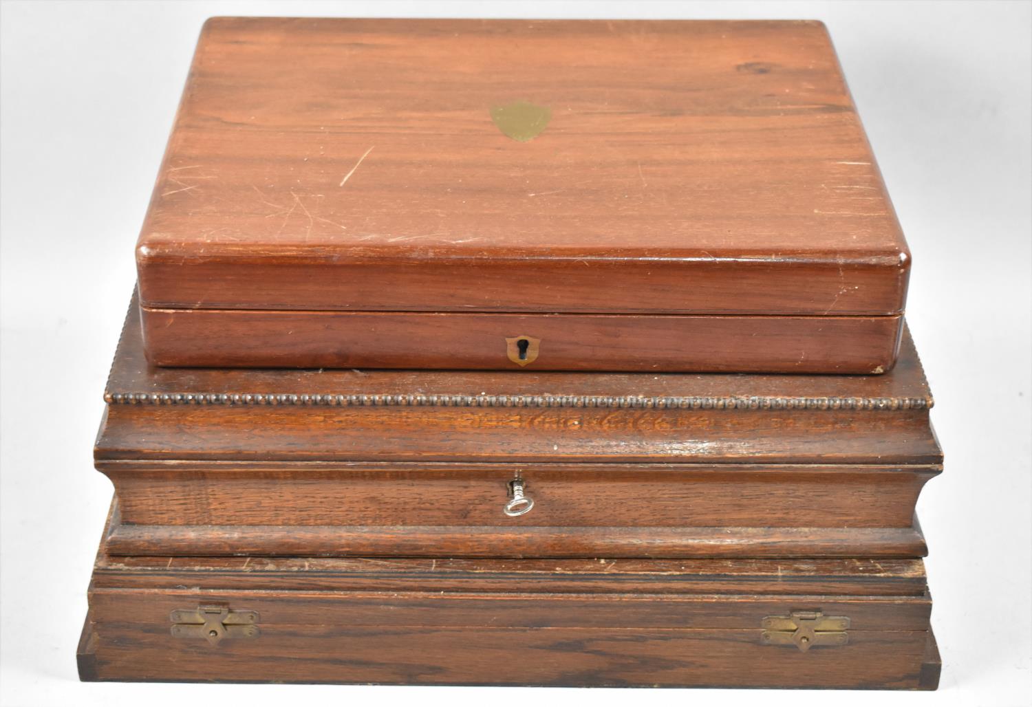 Three Edwardian and Later Oak and Mahogany Canteen Boxes, the Largest 41cms Wide