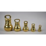 A Set of Five Graduated Brass Bell Weights, The Heaviest 4lbs