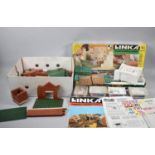 A Vintage Linka Model Building System Together with Plastic Building Blocks