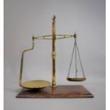 A Set of Late Victorian/Edwardian Brass Balance Scales on Mahogany Plinth Base, 45cms by 25cms