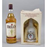 A 1lt Bottle of Bells Blended Scotch Whisky and Bells Commemorative Decanter by Wade to