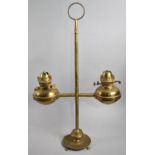 A Late Victorian/Edwardian Brass Rise and Fall Two Branch Oil Lamp with Ring Carrying Handle, 70cm