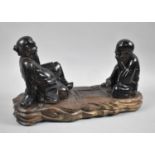 An Oriental Carved Wooden Study of Two Seated Gents Playing Checkers , 43cm wide, One Finger AF