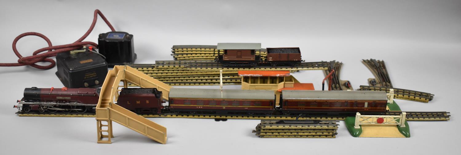 A Vintage Three Rail Train Set to Include Duchess of Atholl Locomotive and Tender, Railway Crossing,