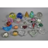 A Collection of Various Glass Paperweights