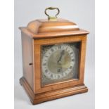 A Modern Walnut Cased Mantel Clock with Silvered Chapter Ring and Brass Spandrels, Movement Runs for