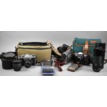 A Praktica 35mm Camera, Two Camera Bags, JVC Camcorder Together with Other Vintage Cameras, Lens and