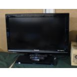 A Panasonic Viera 31" Television, with Remote together with a Panasonic DVD Player