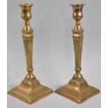 A Pair of Regency Brass Candlesticks with Fluted Tapering Supports, 26cm high