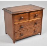 A Late Victorian/Edwardian Mahogany Miniature Chest of Two Short and Two Long Drawers, Perhaps an