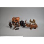 A Collection of Carved African and Asian Wooden Souvenir Ornaments