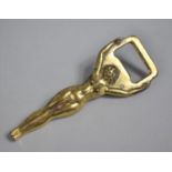 A Novelty Brass Bottle Opener in the Form of a Standing Nude, 10.5cms High