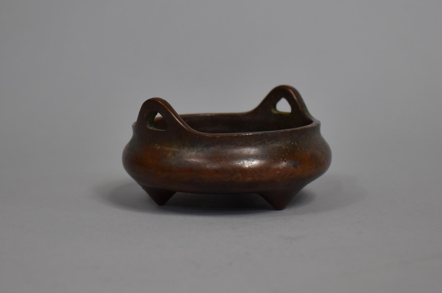 A Small Bronze Chinese Censer with Tripod Support, Seal Mark to Base 7.5cm diameter and 4cm high - Image 2 of 3