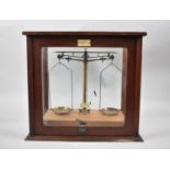 An Edwardian Mahogany Cased Chemists Balance by Becker & Co., 39cm wide