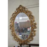 An Ornate Gilt Framed Wall Mirror, 63x43cm Overall